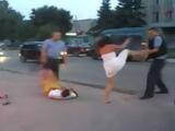 Furious Chick Beating The Police Officers While Her Boyfriend Gets Knocked Out