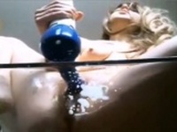 Blonde girl gets milk enema and squirts
