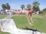 Dumb girl loses bikini on water slide at Coachella