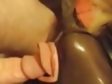 Rubber girl deeply throat fucked while bound by Master 